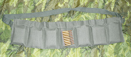 The cotton M3 bandoleer had seven pockets that were each designed to contai...
